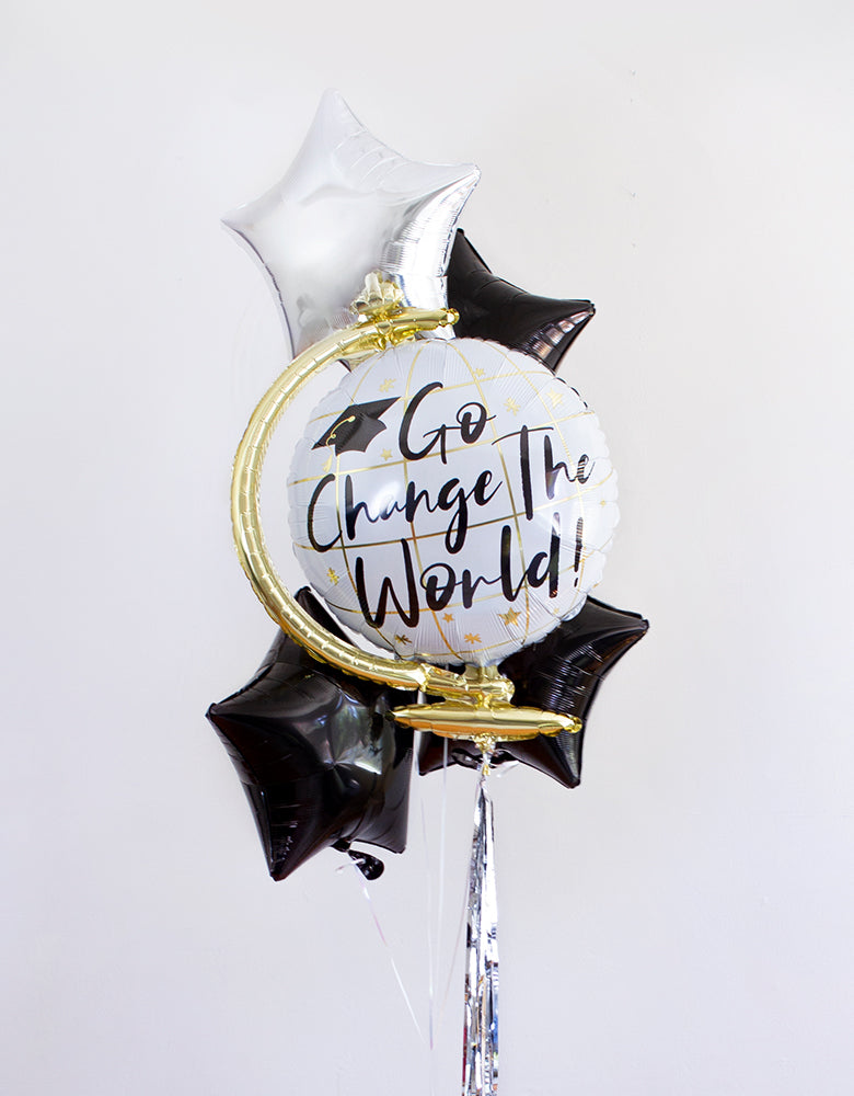 Go-Change-The-World-Graduation-Foil-Balloon-Bouquet with anagram GO CHANGE THE WORLD FOIL MYLAR BALLOON and Black start foil balloons and Sliver Start Balloons and sliver tassel 