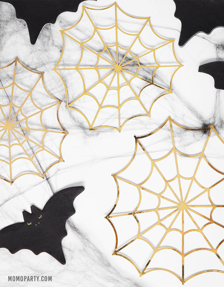 Table set up for a halloween party with Party Deco Bat Napkins and Gold Spiderweb Decorations on the marble tabletop. Morden and high quality party tableware sell by party online store, party boutique online store, party supplies at momoparty.com