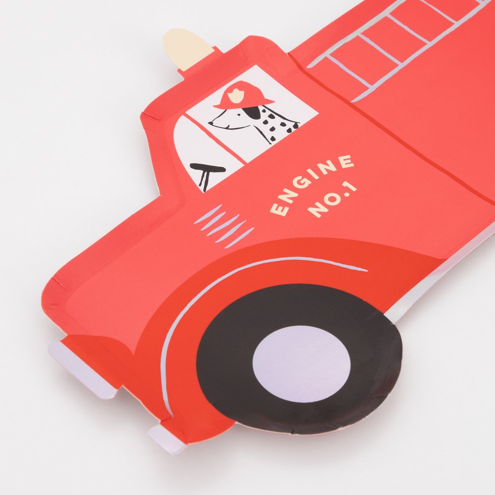 Details of Fire Truck Plates By Meri Meri. This 13 inches fire truck shaped large plates in classic red and cute illustration of a dalmatian puppy as the driver on a truck with "Engine No. 1" on the side, they're stylish yet practical , perfect for a little boy's firefighter or fire truck themed birthday celebrations
