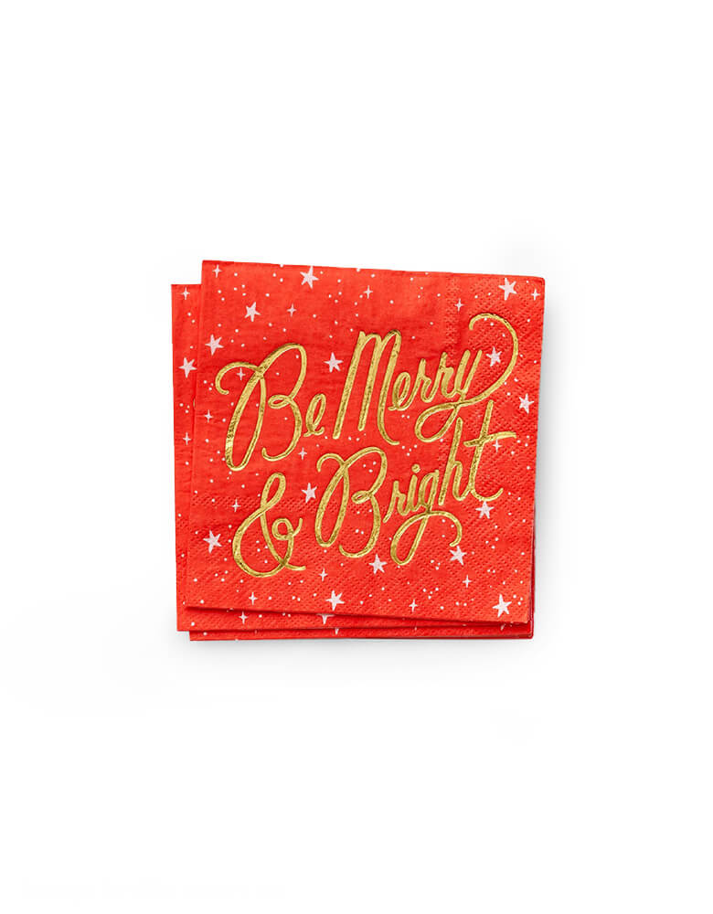 Rifle Paper Co - Holiday Small Napkins. Featuring gold foil lettering of "Be Merry & Bright" and twinkling stars print on red napkin, These festive small napkins bring a little extra joy to your holiday punch bowl