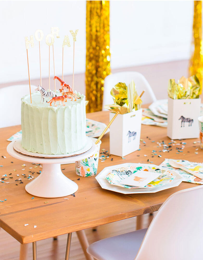 Kid's Safari themed birthday party featuring Daydream Society Into The Wild Collection and Temporary Tattoos