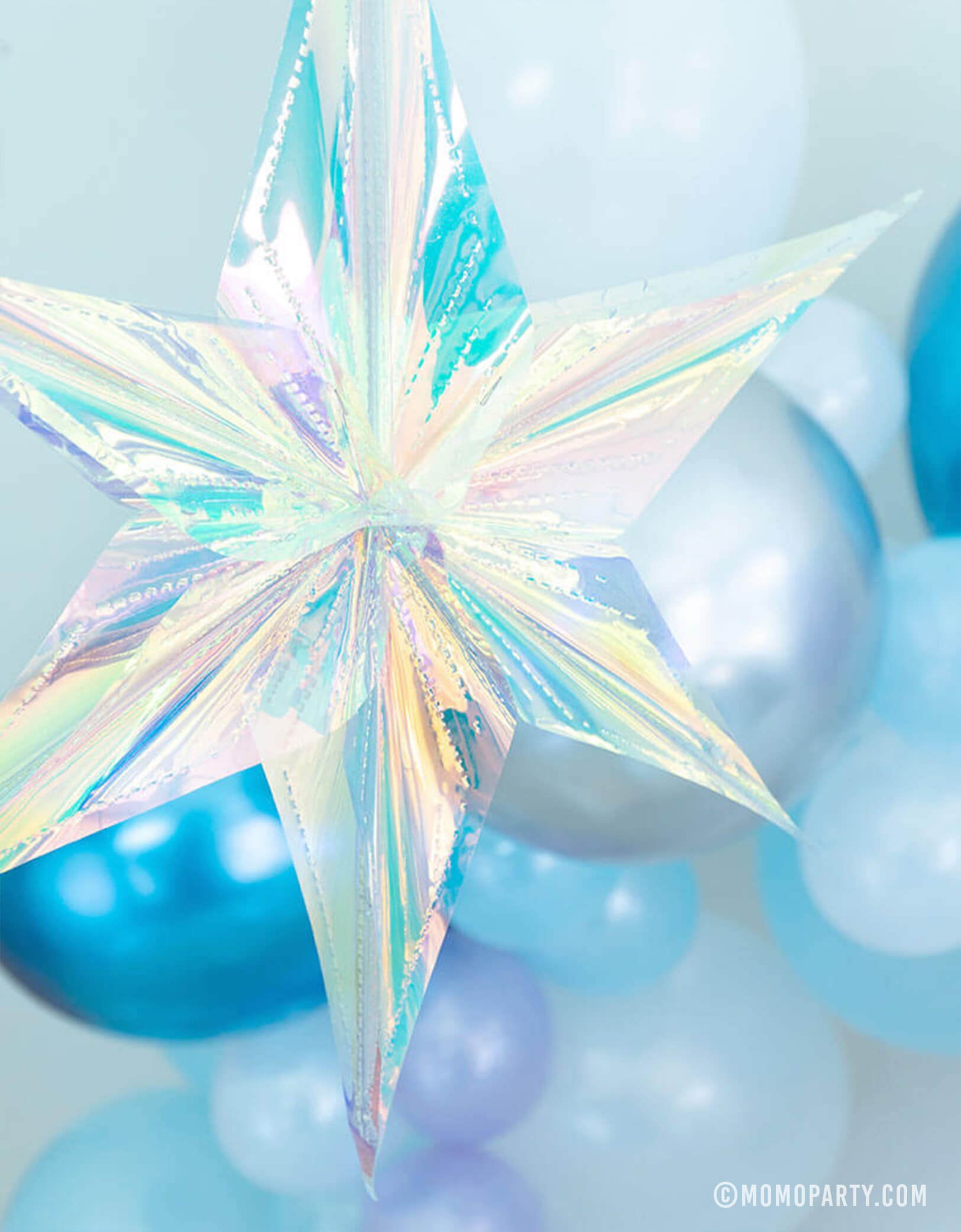 16" Iridescent Star hanging Decoration in front of a beautiful balloon garland with blue, purple and silver color combos for a girls Frozen themed party