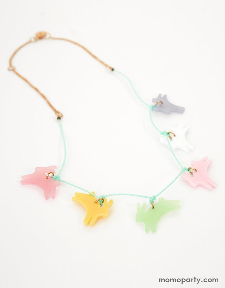 Meri meri Leaping Bunny Necklace. This bunny necklace is a wonderful accessory to wear to Easter, or springtime, parties. The bunnies are crafted from acrylic in 6 colors - frosted blue, white, frosted pink, frosted mint, yellow and pink, with a gold tone chain and mint cord necklace. A gold tone metal chain and lobster clasp give a stylish look.