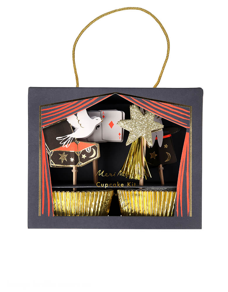 Meri Meri Magic Cupcake Kit. It includes 24 toppers in 4 designs, featuring gold glittering stars, cards, rabbits popping out of a hat and doves. It also has 24 cases crafted from gold foil. The kit is presented in a special magic show box, with a gold cord handle - and makes a fantastic gift!