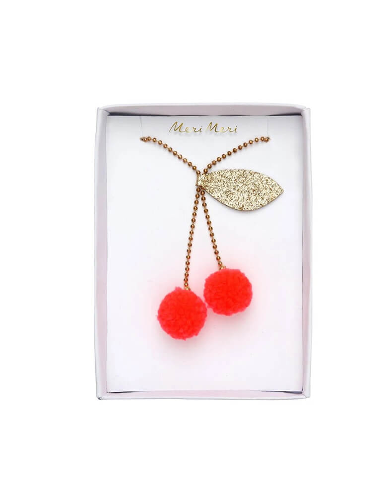 Meri Meri Cherry Pom Pom Necklace with clear box package. Featuring Yarn pompoms with gold glitter fabric on a Gold enamel bead chain. This beautifully crafted cherry pompom necklace is simply charming. Perfect as a gift for someone who loves quirky accessories. Sell in the clear box package, this pom pom cheery Pendant Necklace Jewelry is perfect gift for Girls, fruit Lover, Birthday gift, Gifts for Daughter, easter basket gift, back to school gift or stocking stuffer filler