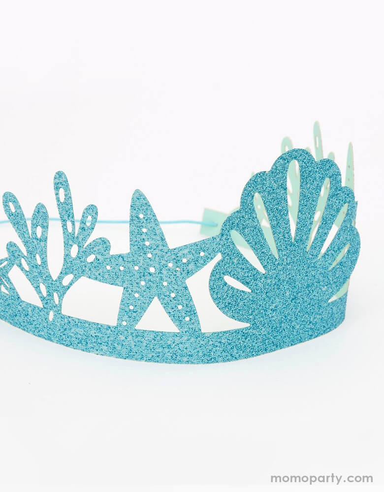 details of Meri Meri Aqua Blue Glittered Mermaid Party Crown. Featuring gorgeous designs of starfish, shells and sea plants, these crowns are crafted with lots of shimmering eco-friendly blue glitter for a dazzling effect