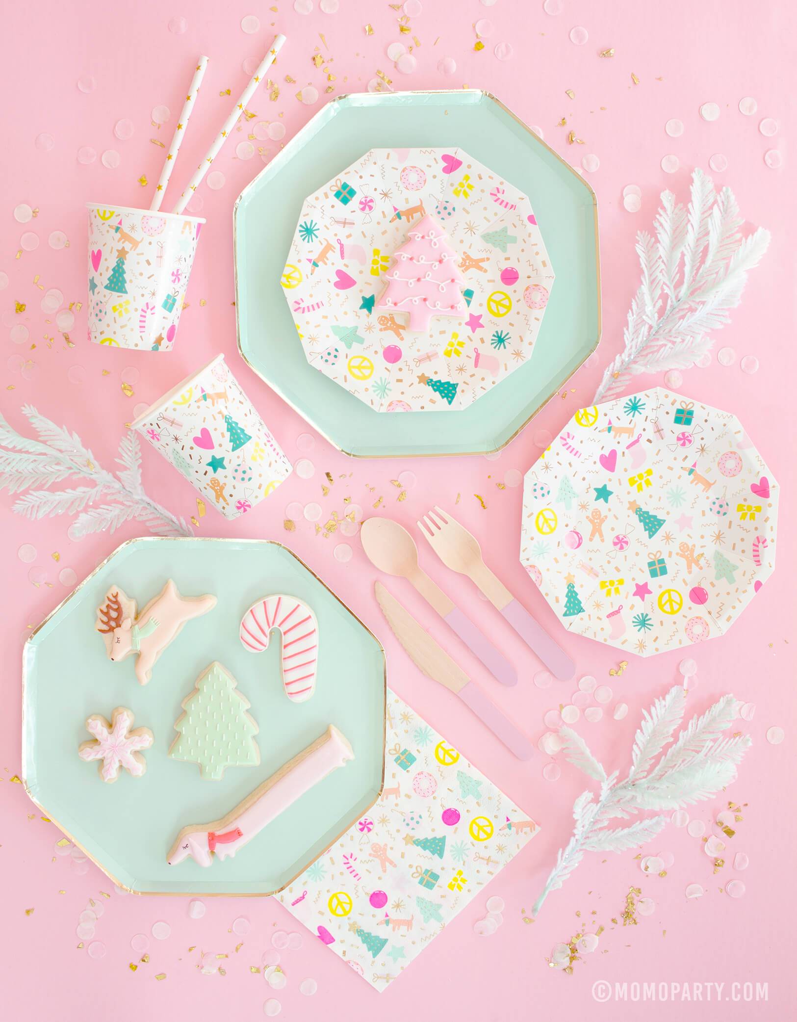 Meri Meri Mint Large Dinner Plates pair with Daydream Society Merry and Bright Holiday Christmas Party Plates,Napkins and Cups, Pink wooden utensils, Christmas themed cookies for a pastel Christmas party celebration