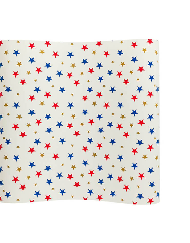 Momo Party's Multi Stars Paper Table Runner by My Mind's Eye. Featuring red, blue and gold star pattern over a cream paper table runner, A fun festive backdrop for all of your patriotic or superhero themed parties!