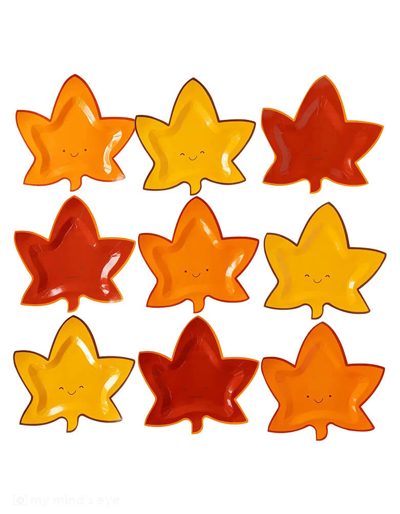 A set of 9 My Mind's Eye Harvest Cute Leaf Shaped Plates with smiley face on them in 3 different colors/designs of red, orange and yellow