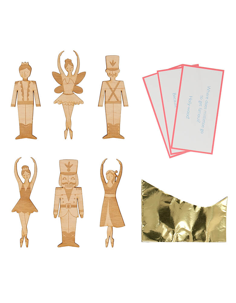 Meri Meri 217612 Nutcracker Character Crackers. Set of six contains a gold foil paper hat, a joke, and an etched wooden Nutcracker character brooch, with a gold tone pin. Prefect fun gift for the Holiday season!