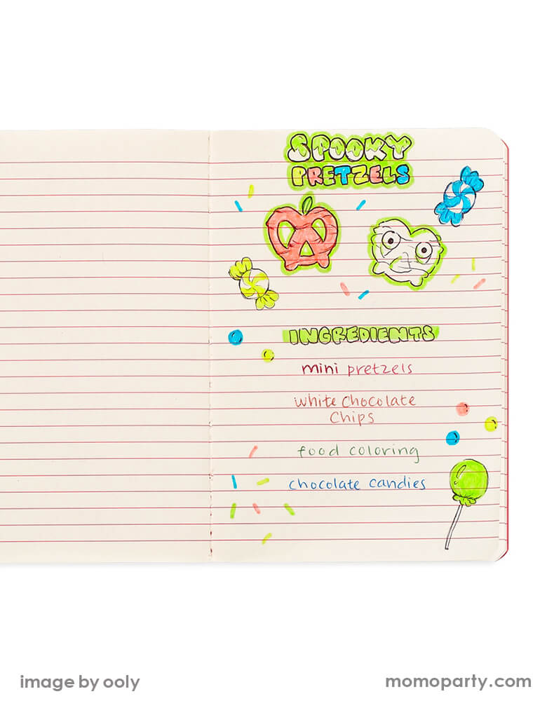 Spooky Pretzels drawing with ingredients notes in the OOLY jot-it! planets notebook. With 64 pages of lined paper held together with stitched binding and a holographic cover with Planets design, this adorable notebook with colorful planets notebook makes for a great planner, calendar and idea-holder. This is perfect No sugar gift for a schooler, space lover, blast off space party gift, back to school supplies, back to school gift and great notebook for everyone