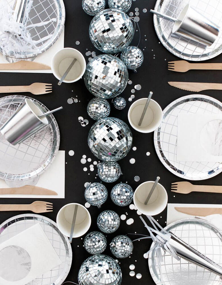 Oh Happy Day_Disco Party table featuring Disco Ball Plates, silver cups and napkins with multiple disco balls as centerpiece