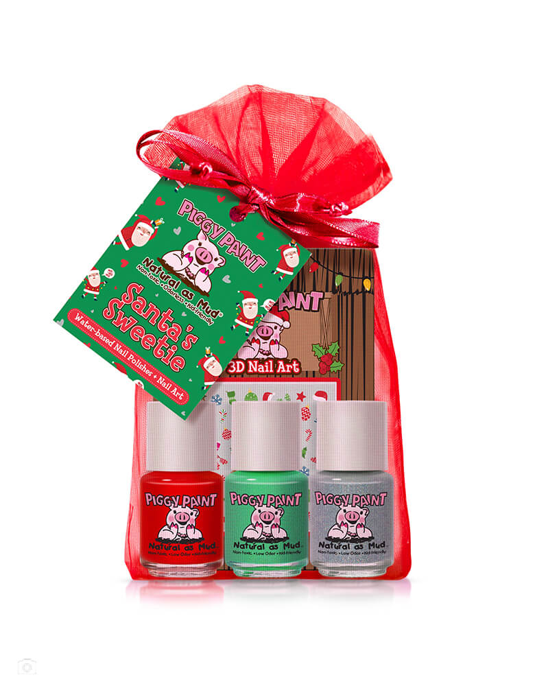 Piggy Paint Nail Polish Gift Set - Santa's Sweetie.   Add a little Holiday cheer to your little one's hands with this festive Christmas themed nail polish set which includes 3 fun and safe nail polishes  and one sheet of Christmas Cutie 3D Nail Art sticker in a Red Sheer Organza Bags. There are Non-toxic, odorless & safe for all ages. Cruelty-free + Vegan and Made in the USA. These are prefect gift and stocking stuffer for holiday. Morden and high quality party boutique online store at momoparty.com
