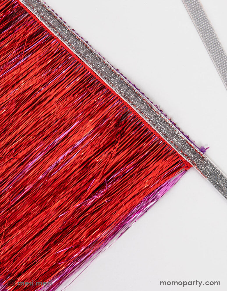 Details of Meri Meri 6-feet-Red and Pink Tinsel Fringe Garland. This gorgeous red and pink tinsel garland is perfect to add style and shimmer in seconds. It'll look great at any party or celebration where you want a touch of sparkle. Perfect for your Valentine's/Galentine's Day or princess themed party!