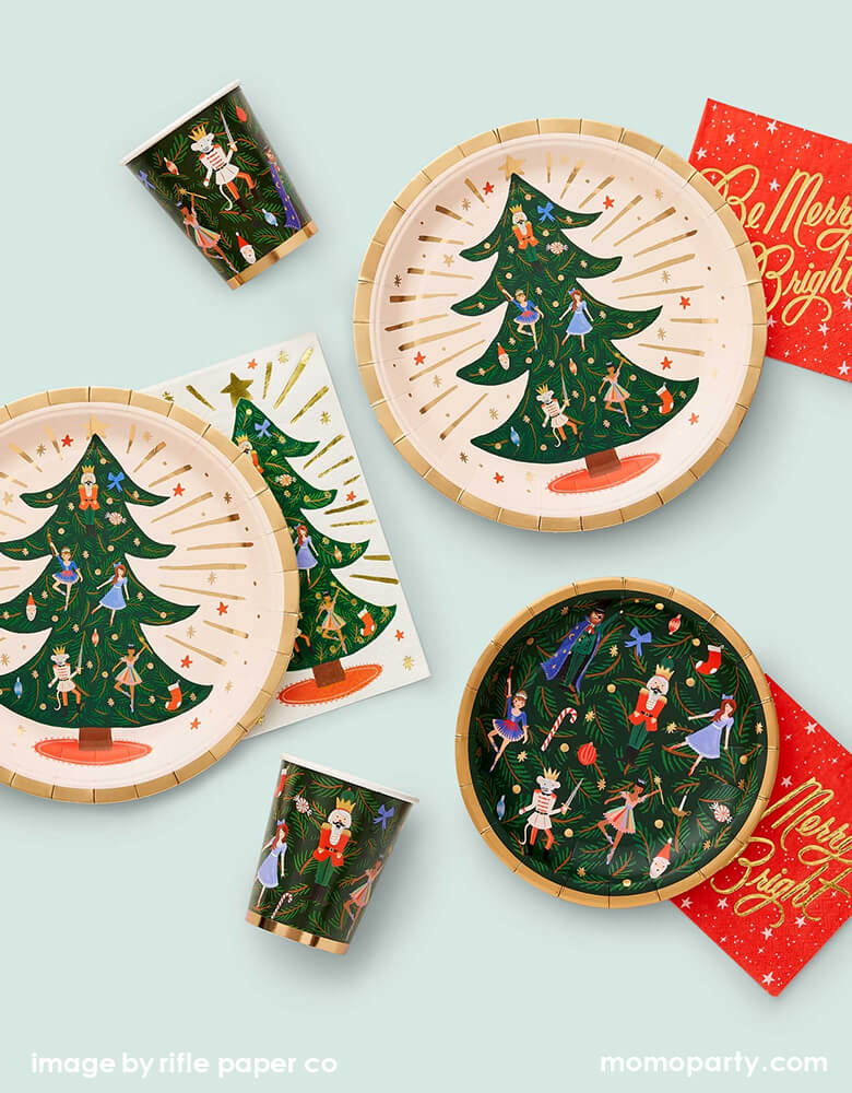 Rifle Paper Co Holiday collection with Nutcracker Large plates,Nutcracker Small Plates, Nutcracker cups, Nutcracker Guest Napkins and Holiday Small Napkins print with gold foil lettering of "Be Merry & Bright". Add some extra festive charm to your holiday table with these larger-than-life tree design from the Nutcracker ballet, a few of your favorite characters and gold foil accents for an extra-special holiday celebration.