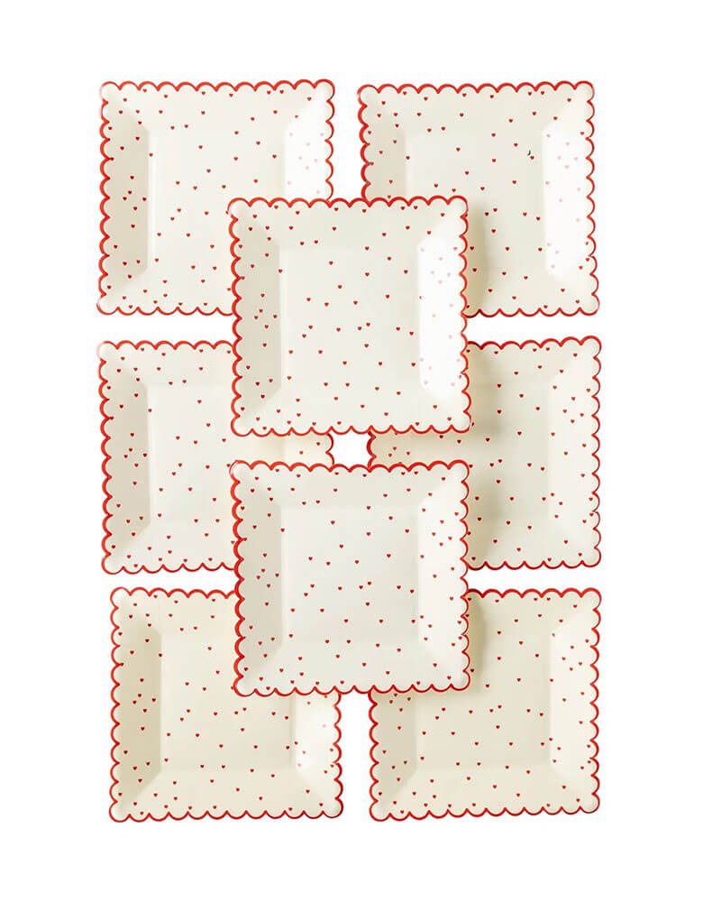 Momo Party's 8" square scattered red heart scallop plates by My Mind's Eye, comes in a set of 8 plates, they feature a scalloped edge and a pretty scattered heart design these plates are the perfect way to show your guests some love, or pass out sweet Valentine's Day cookies that are sure to spread cheer to your loved ones.