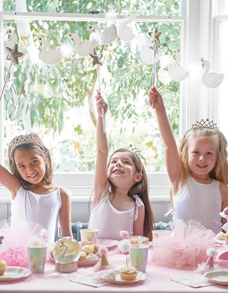 girls in the princess party wearing Tiara and holding Pink Gold star Wand