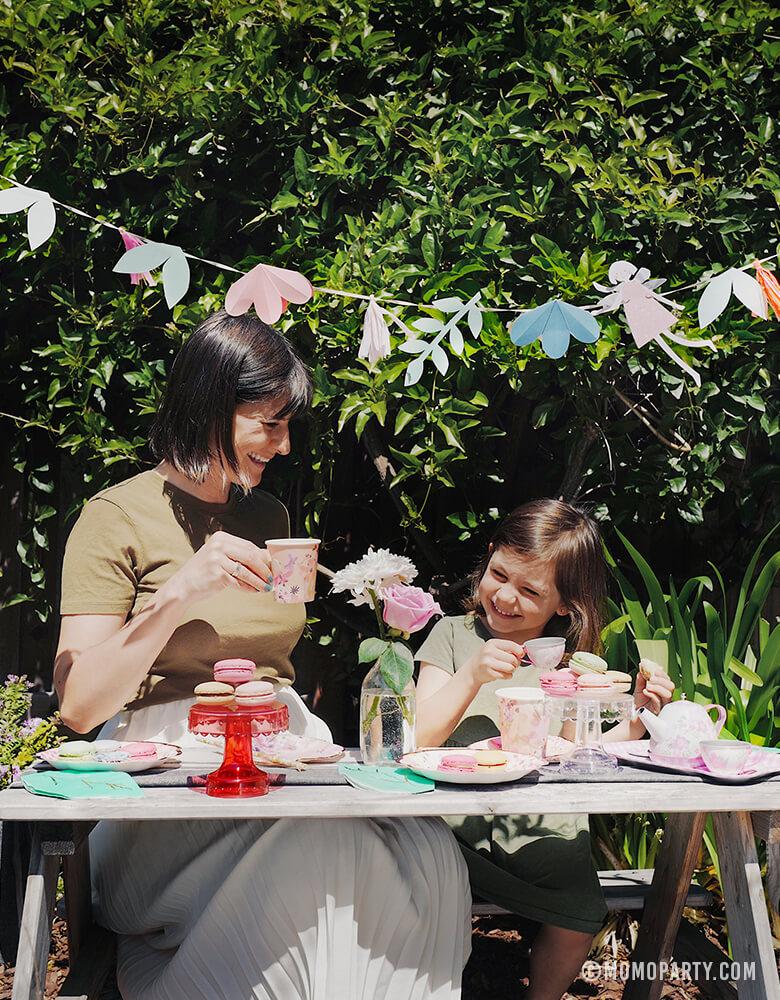 Mother Daughter Mother's day Tea Party celebration with MeriMeri-Fairy-Garland with fairy pennants, flowers, Talking Tables' Blossom Girls Small Plates and cups