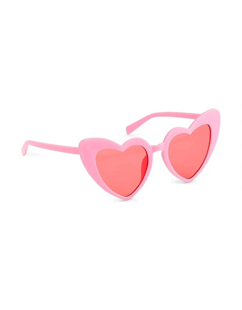 Momo Party's 6x6" women's heart shaped sunglasses by Weddingstar Inc. Cool shades for a Galentine's Day gathering, bachelorette party, bridal shower, or other bridal party outings, the heart sunglasses are a unique twist on the classic cat eye shaped glasses. With red heart frames around the sunglass lenses to create a novelty look.