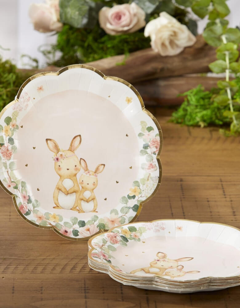 Woodland Baby Small Paper Plates - Pink by Kate Aspen. These baby shower plates feature an adorable mama and baby woodland creatures. They are pink with dark green and pink florals scattered around the scalloped edges for a beautiful fancy floral garden arrangement hugging the edges of these adorable decorative paper plates