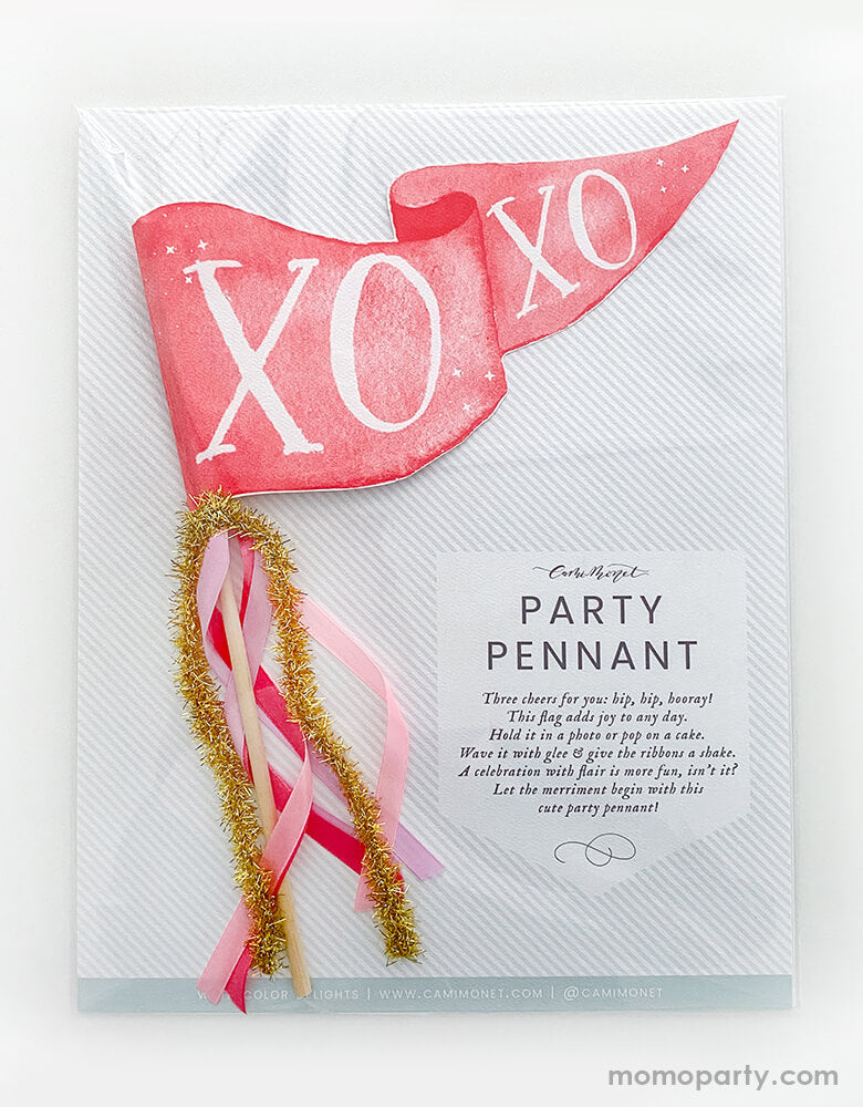 Cami Monet - XOXO Party Pennant in a hard cardboard and clear package. This Handmade pennant made in United States of America, in Size: 10 x 5 inches. This is made of 120 lb. luxe watercolor texture paper with handwriting "XOXO" text in watercolor illustration for extra whimsy. With pink and red and gold mixed Ribbon and sparkle garland. This adorable party pennant is a perfect for a sweet Valentine's Day celebration!
