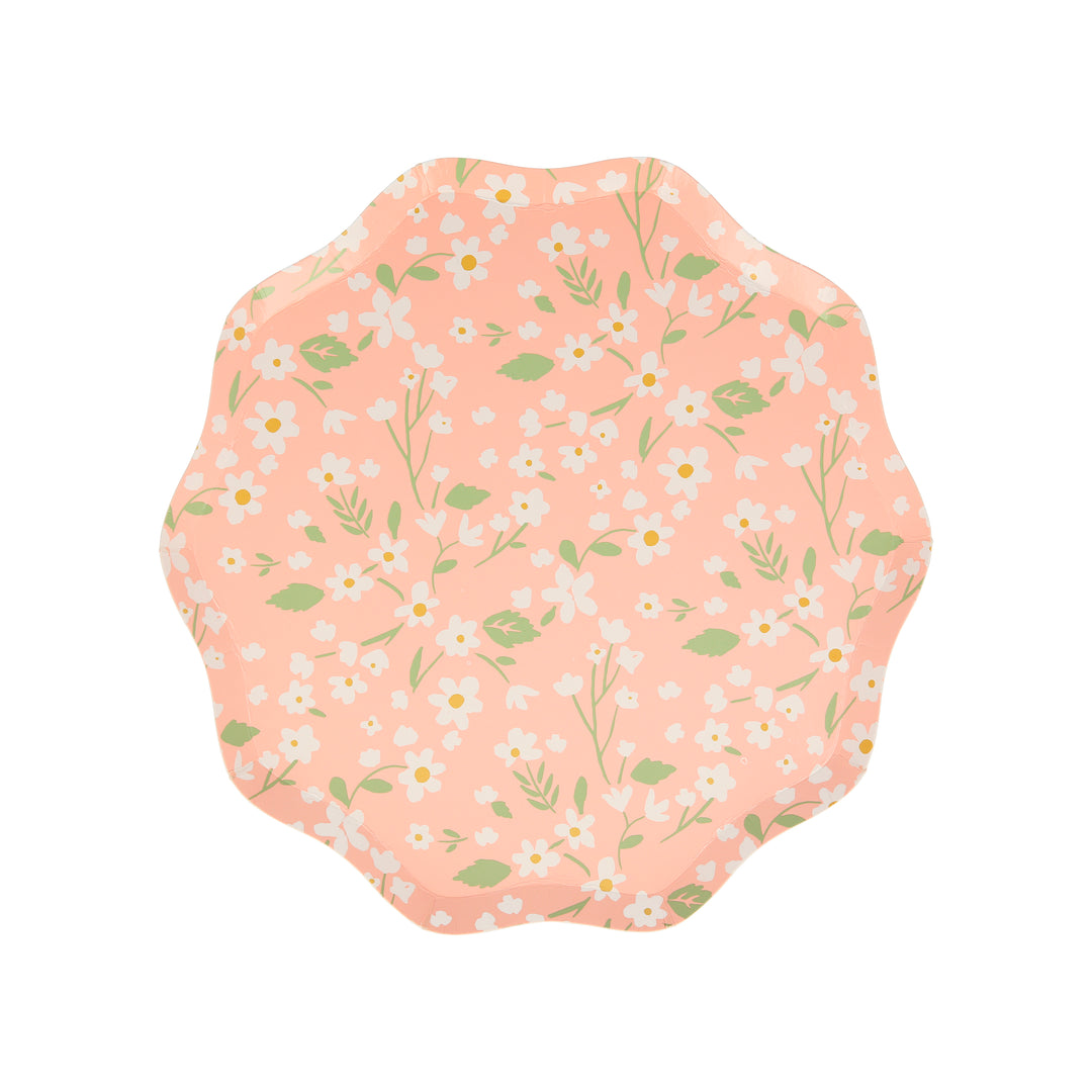 Ditsy Floral Dinner Plates By Meri Meri. Features a fabulous floral pattern with a stylish scalloped edged in coral color designed paper plates. Made from eco-friendly paper. Add a touch of springtime beauty to your party table with these high quality, well designed party plates.