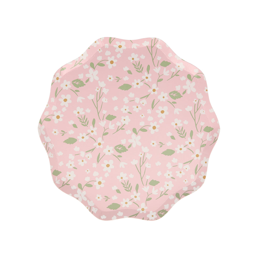 Ditsy Floral Dinner Plates By Meri Meri. Features a fabulous floral pattern with a stylish scalloped edged in pink color designed paper plates. Made from eco-friendly paper. Add a touch of springtime beauty to your party table with these high quality, well designed party plates.