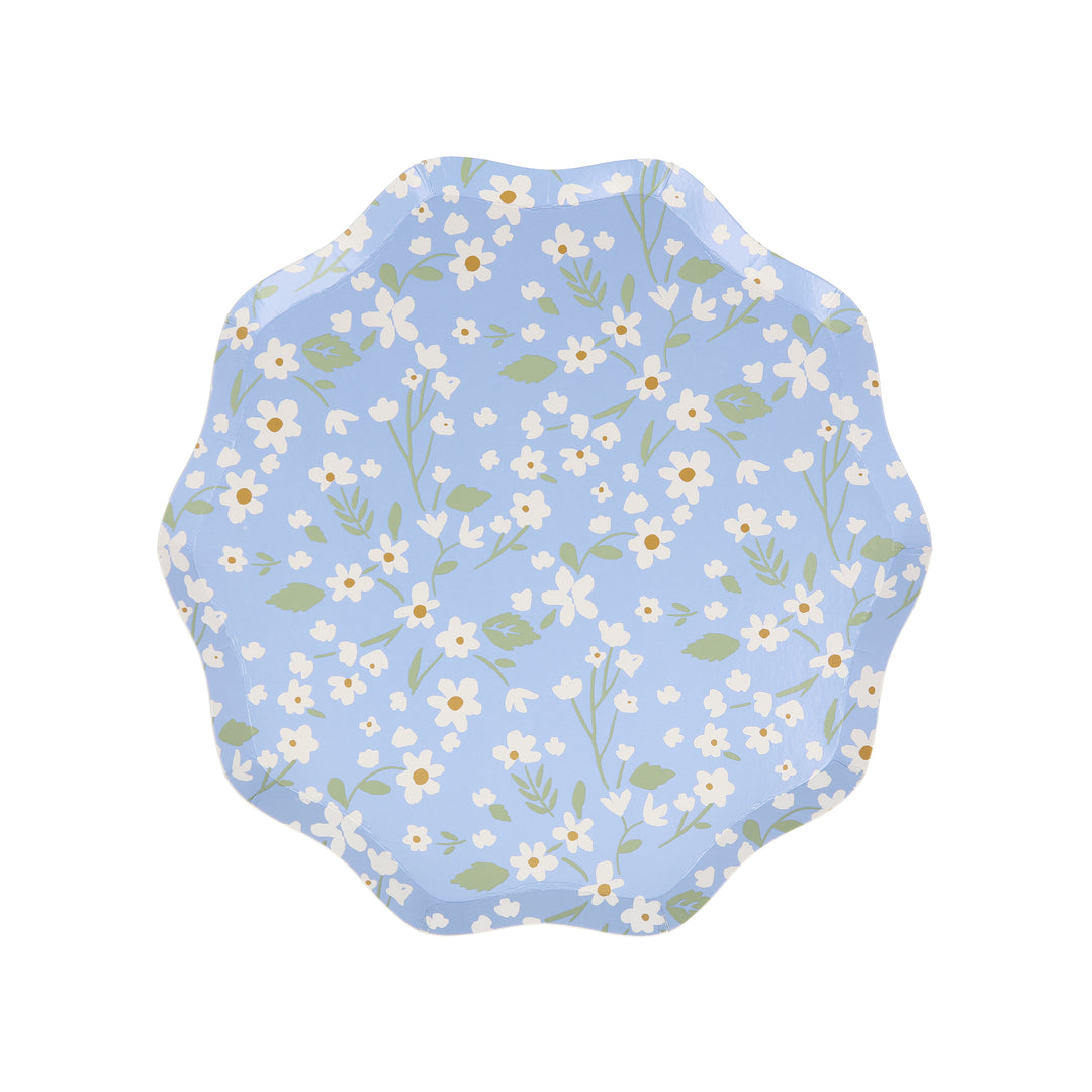 Ditsy Floral Dinner Plates By Meri Meri. Features a fabulous floral pattern with a stylish scalloped edged in blue color designed paper plates. Made from eco-friendly paper. Add a touch of springtime beauty to your party table with these high quality, well designed party plates.
