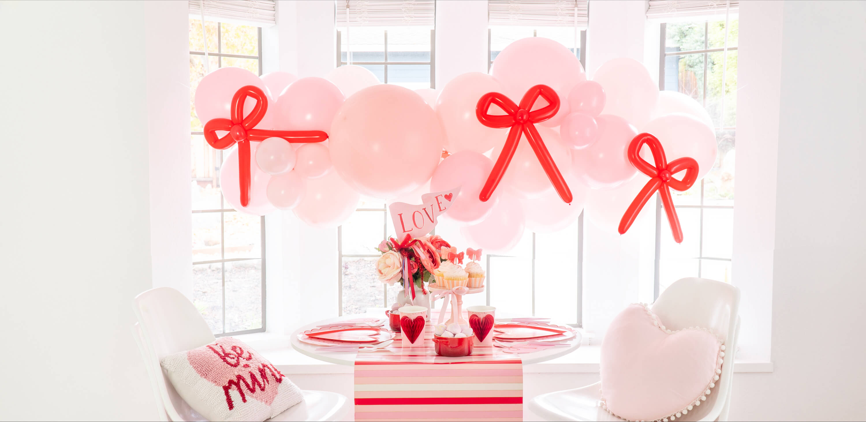 Tying the Knot of Love: A Bow-Themed Valentine's Day Party Set up by Momo Party. What a cute idea for your Valentine's celebration or Galentine's Day with your besties