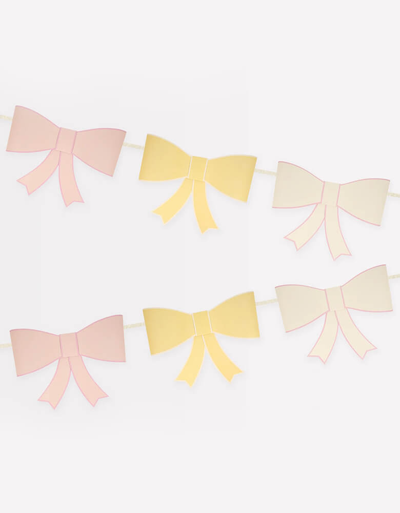 Momo Party's 8 ft 3D Bow Paper Garland by Meri Meri. Each garland features bows in 3 colors - ivory, peach and pale yellow with co-ordinating borders.Make your room look stylish in seconds with this supersized 3D bow garland. Hang it on the wall, above the mantel, in the porch or on the party table, for a statement decoration.