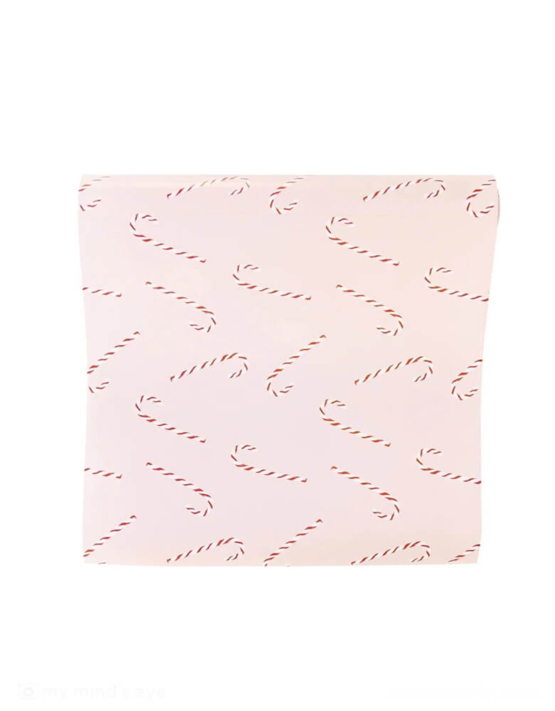 Momo Party's 16 x 120 inches pink candy cane paper table runner by My Mind's Eye. Featuring a festive candy cane pattern on a light pink background, this table runner creates a modern merry scene at your table this Christmas!