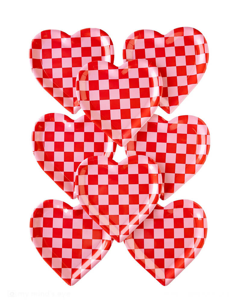 Momo Party's 10" x 10" checkered heart shaped paper plates by My Mind's Eye, set of 8. Dish up your love on this adorable pink checkered heart-shaped plate! With Valentine's Day just around the corner, show your sweetheart you care with this delightful plate - it's checkered and it's heart-shaped. These checkered heart plates are on-trend and are perfect for a Groovy Valentine's or Galentine's Day celebration.