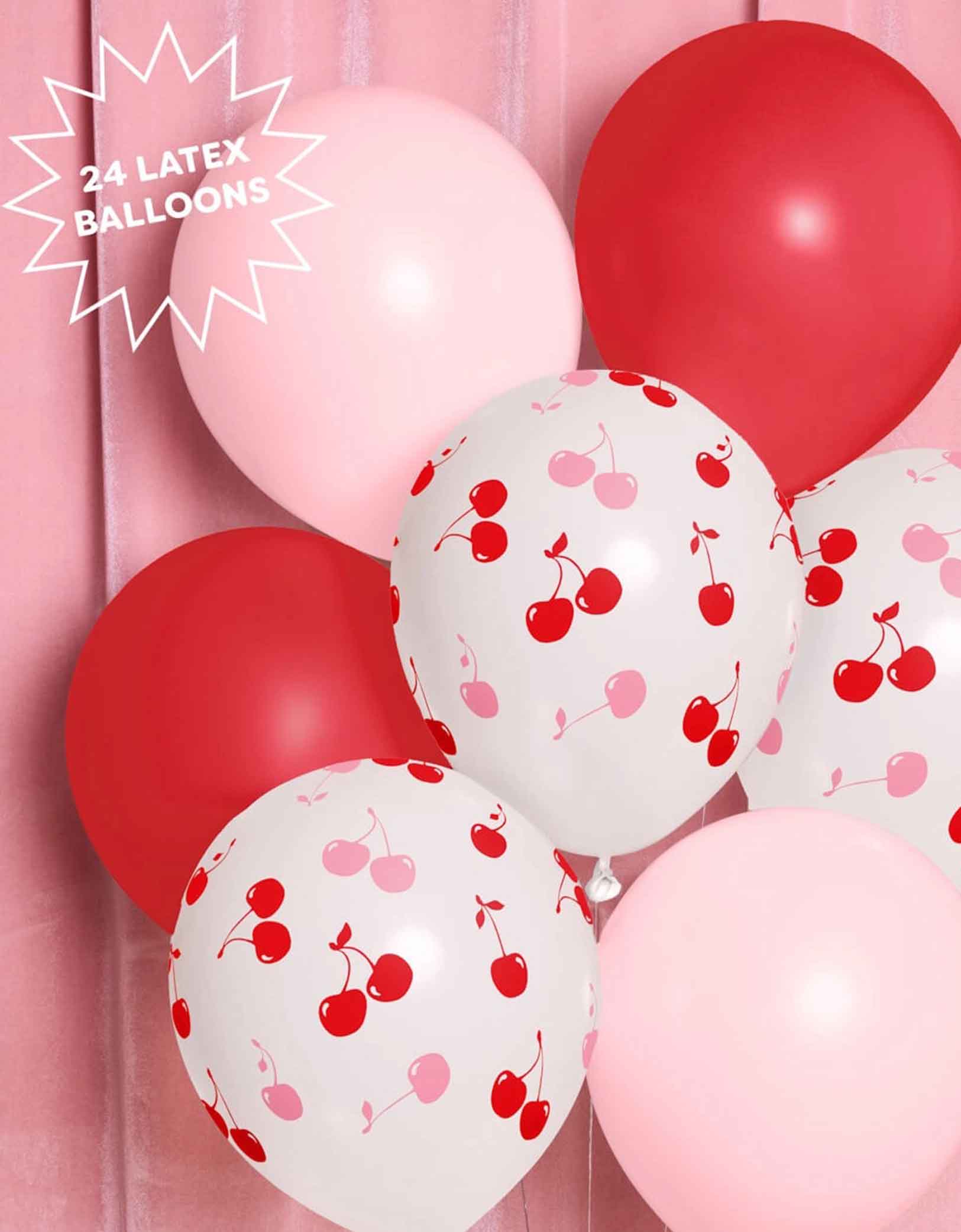 Momo Party's Cherry Print Latex Balloon Mix with red, pink and cherry pink balloons floating against a pink curtain, with a label that says 24 latex balloons. 