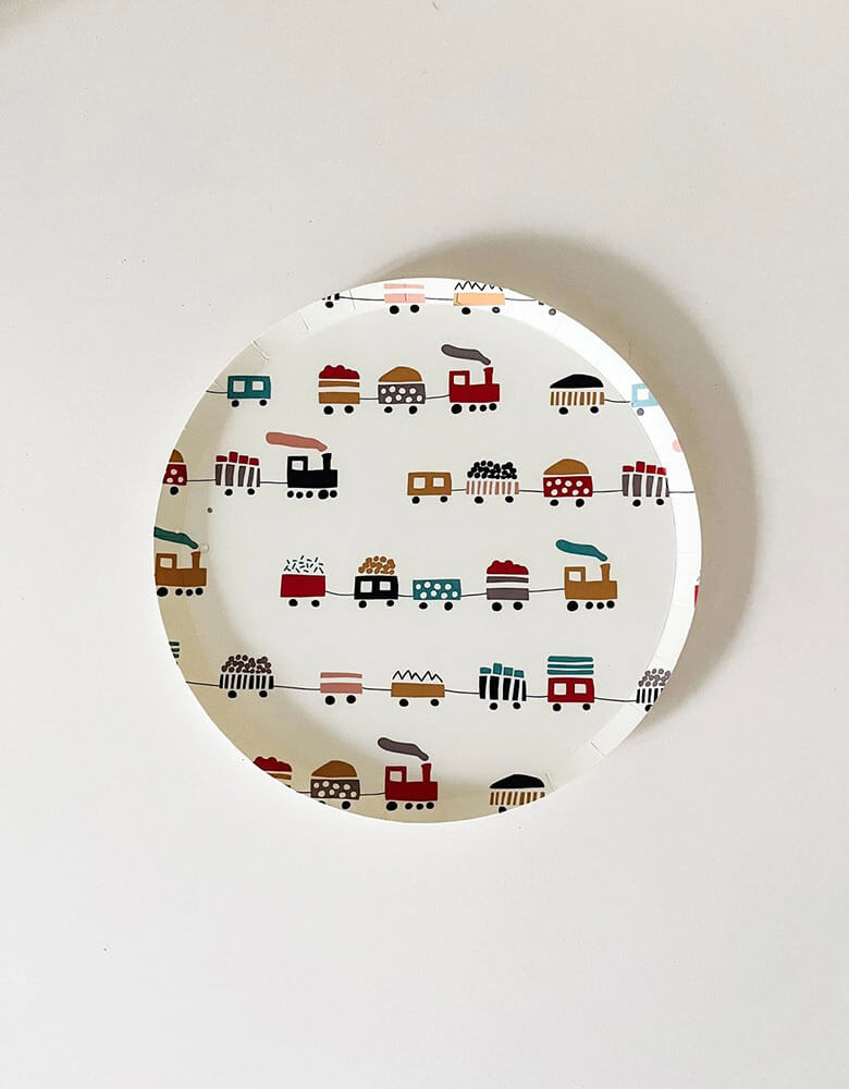 Momo Party's 7" choo choo train round plates by Josi James. With adorable illustration and kid's friendly colors, these plates are perfect for kid's train themed birthday party.