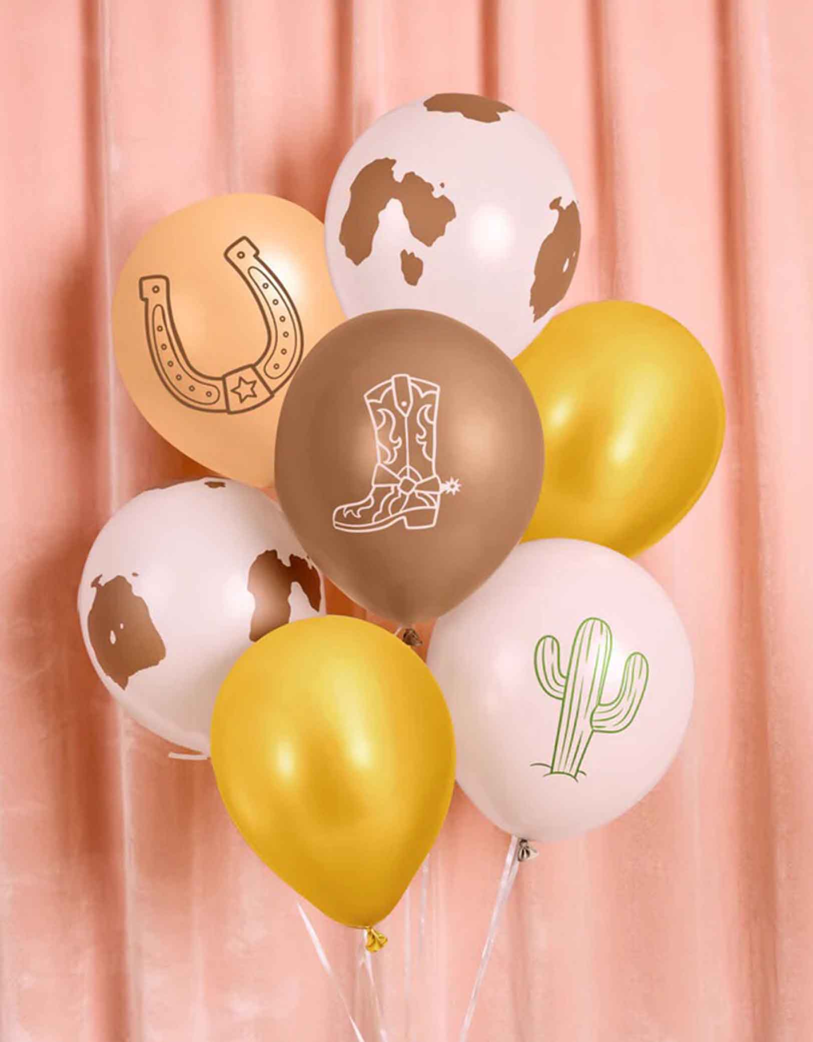 Momo Party's Western themed 12" latex Balloon mix in different colors with cowboy-themed designs including cow prints, cactus, horseshoe and cowboy boot on a pink curtain background.