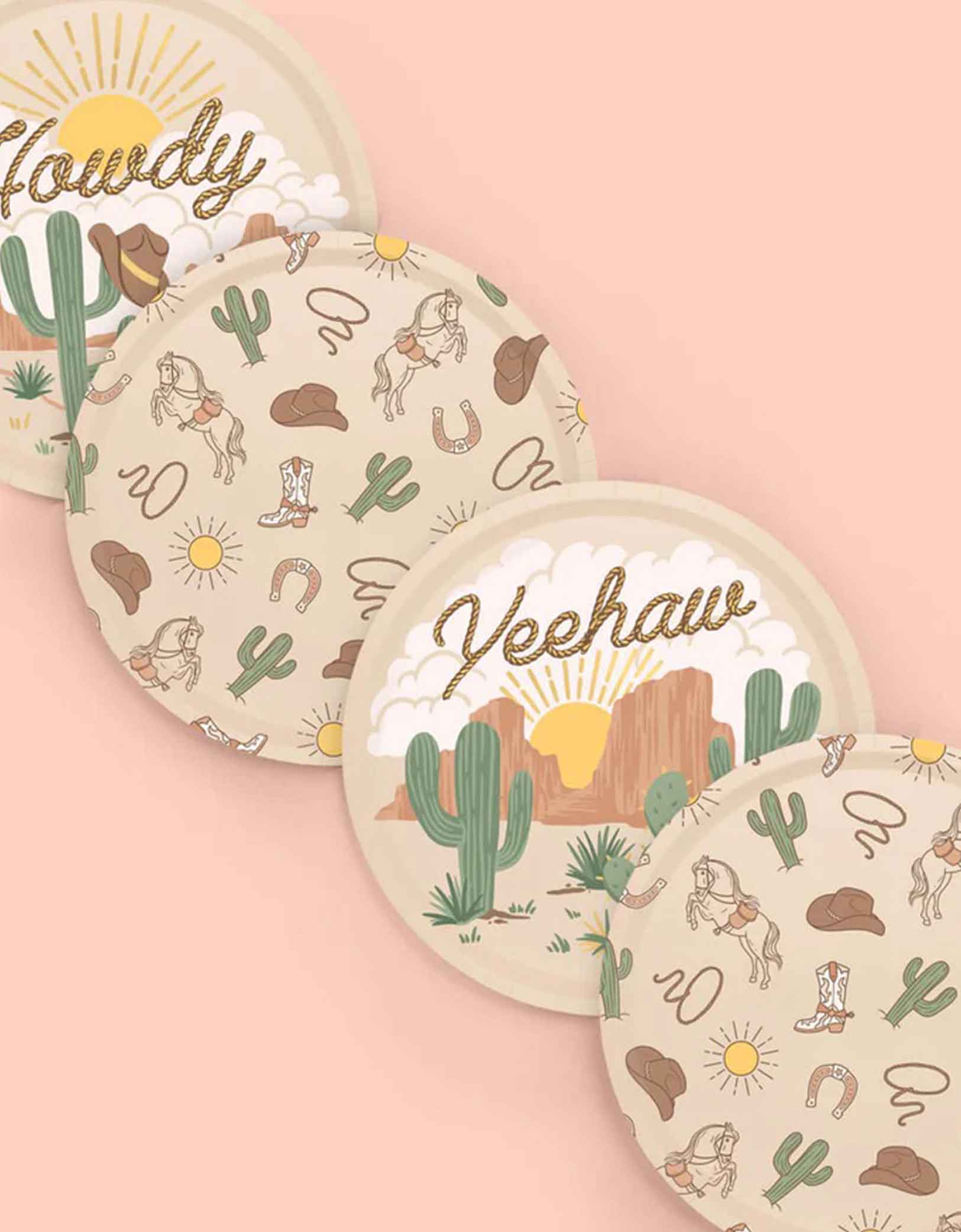 A set of 9" Momo Party's Western themed party plates with cowboy-themed designs on a pink background.