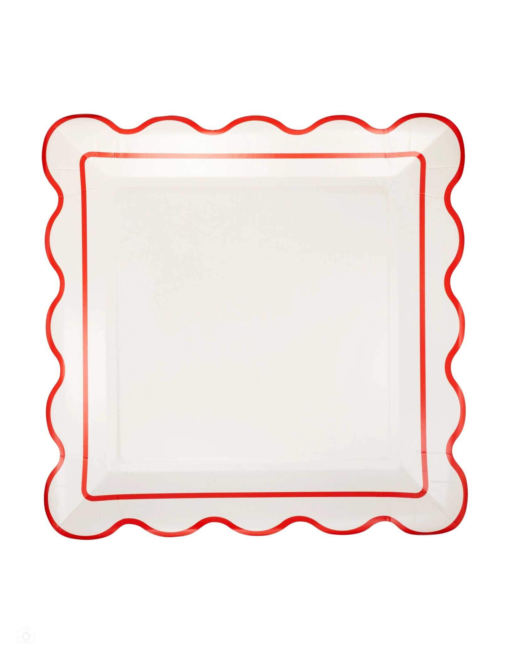Momo Party's 10" cream scalloped-edge square plate by My Mind's Eye on a white background. Elevate your holiday gatherings with this cream Scalloped Square Plate, designed to add a festive touch to any celebration. Its elegant scalloped edges and soft cream color perfectly complement your Christmas party decor, adding a festive and refined touch to your table.