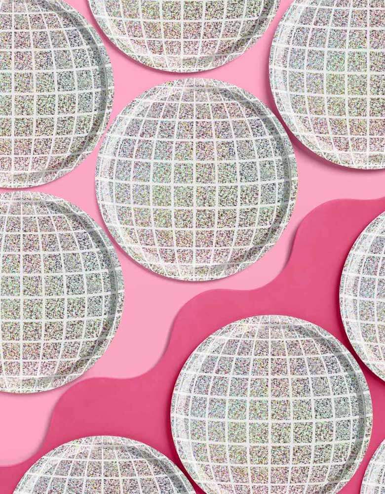 Momo Party's 9" Groovy Disco Paper Plates by Xo, fetti, set of 25 plates. Make the whole place shimmer with these absolutely bejeweled paper plates. Perfect for cake or dinner - this plate set polishes up real nice.