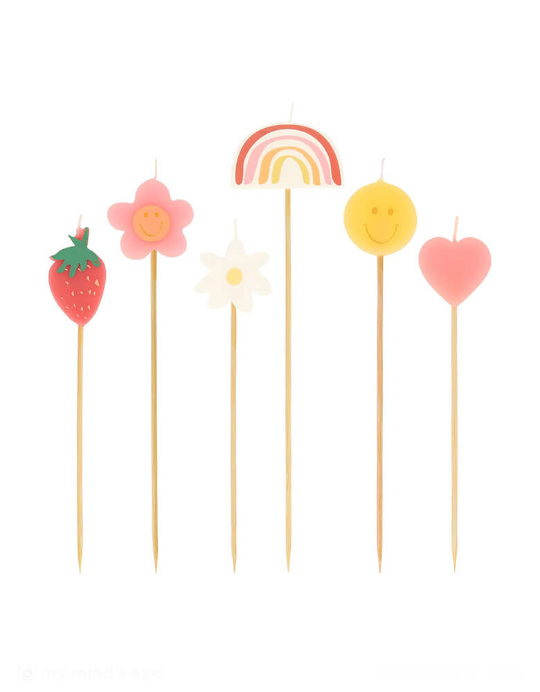 Momo Party's Happy Face Icons Candles by Meri Meri. Comes in a set of 6 candles, featuring a strawberry, a flower, a daisy flower, a rainbow, a smiley face, and a heart, these colorful candles are perfect for any happy celebration!