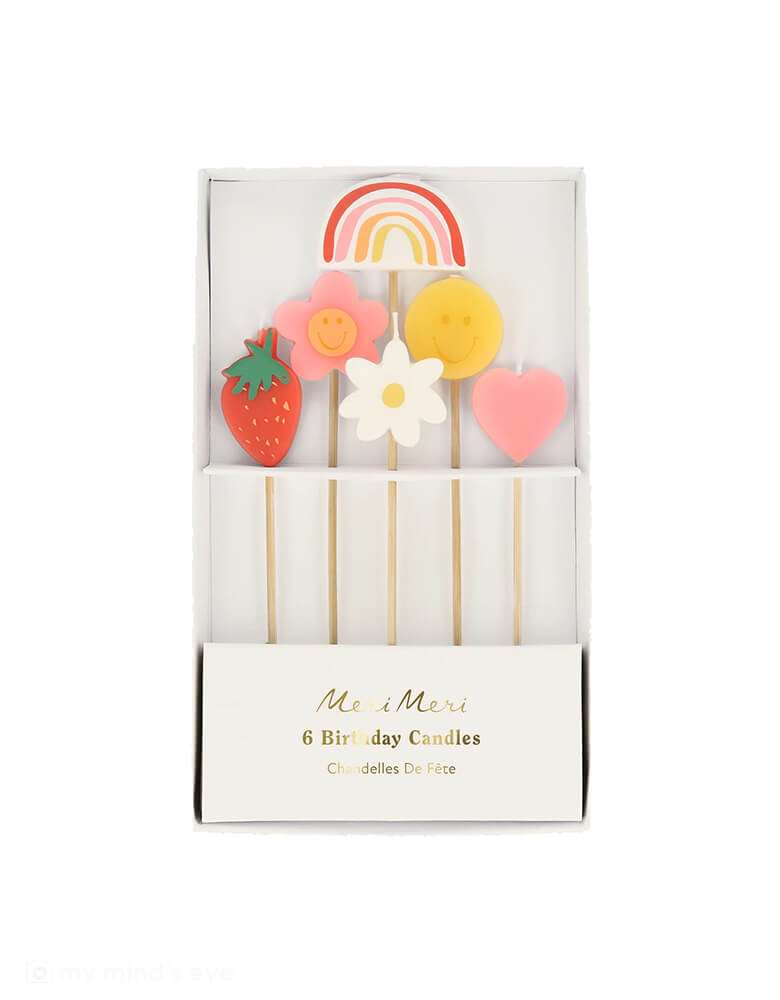 Momo Party's Happy Face Icons Candles by Meri Meri. Comes in a set of 6 candles, featuring a strawberry, a flower, a daisy flower, a rainbow, a smiley face, and a heart, these colorful candles are perfect for any happy celebration!