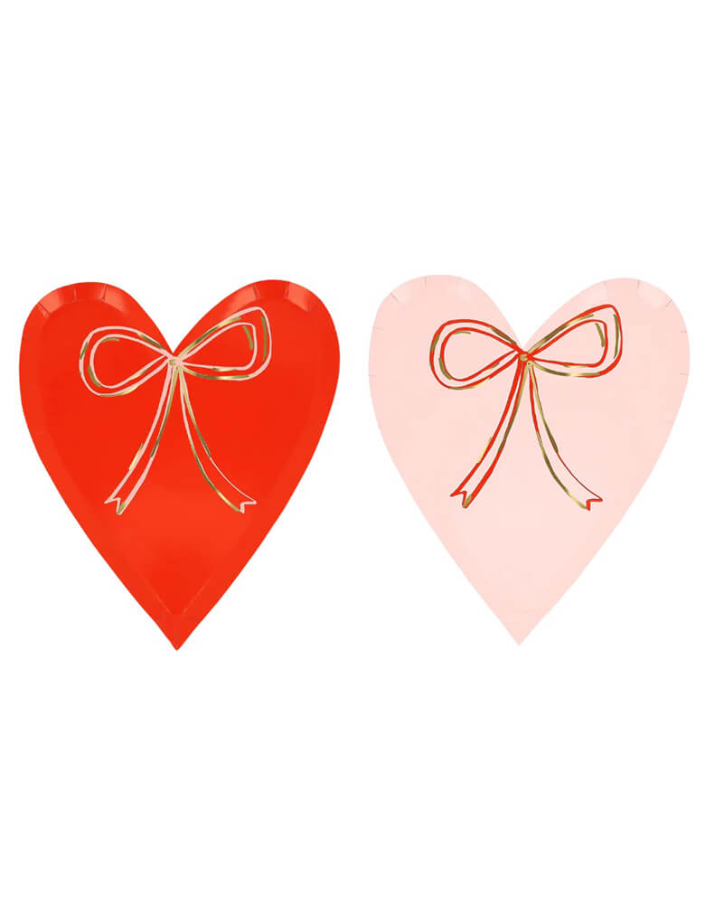 Momo Party's 7.5" x 8.5" Heart With Bow Plates in red and pink by Meri Meri. With shiny gold foil details, these plates are perfect for a sweet Valentine's Day celebration.