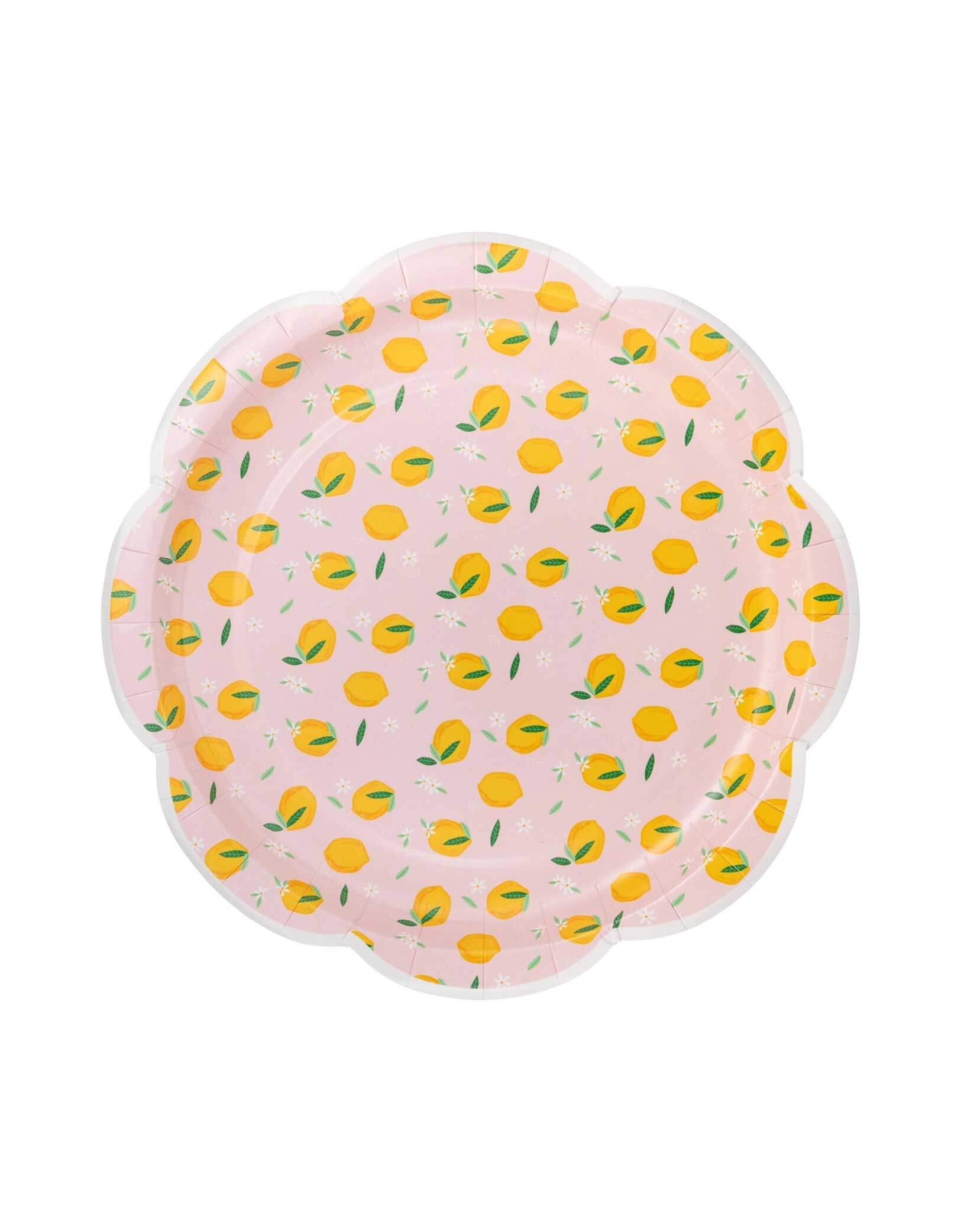 Momo Party's 8" Lemons Scatter plate in light pink background with scallop edge by My Mind's Eye on a white background.