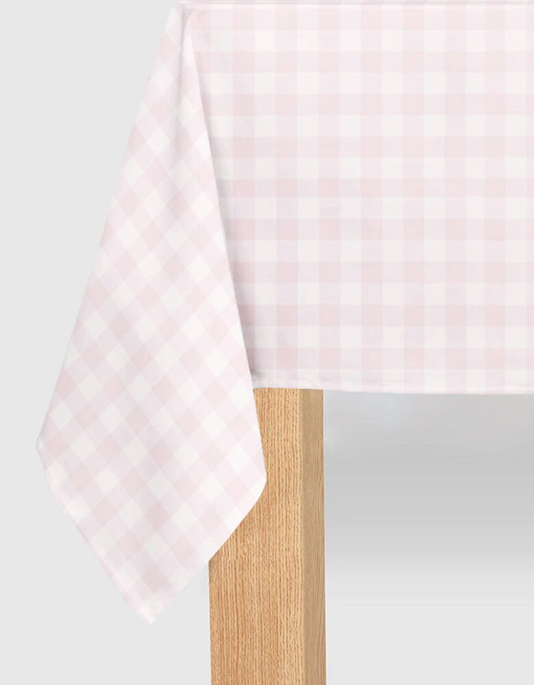 Momo Party's 8.5' x 4.5' pink gingham checkered tablecover by Coterie. In a light pink gingham checkered design, this tablecloth is perfect for a spring picnic, Easter brunch, summer gathering, girl's baby shower, or any girly celebration!