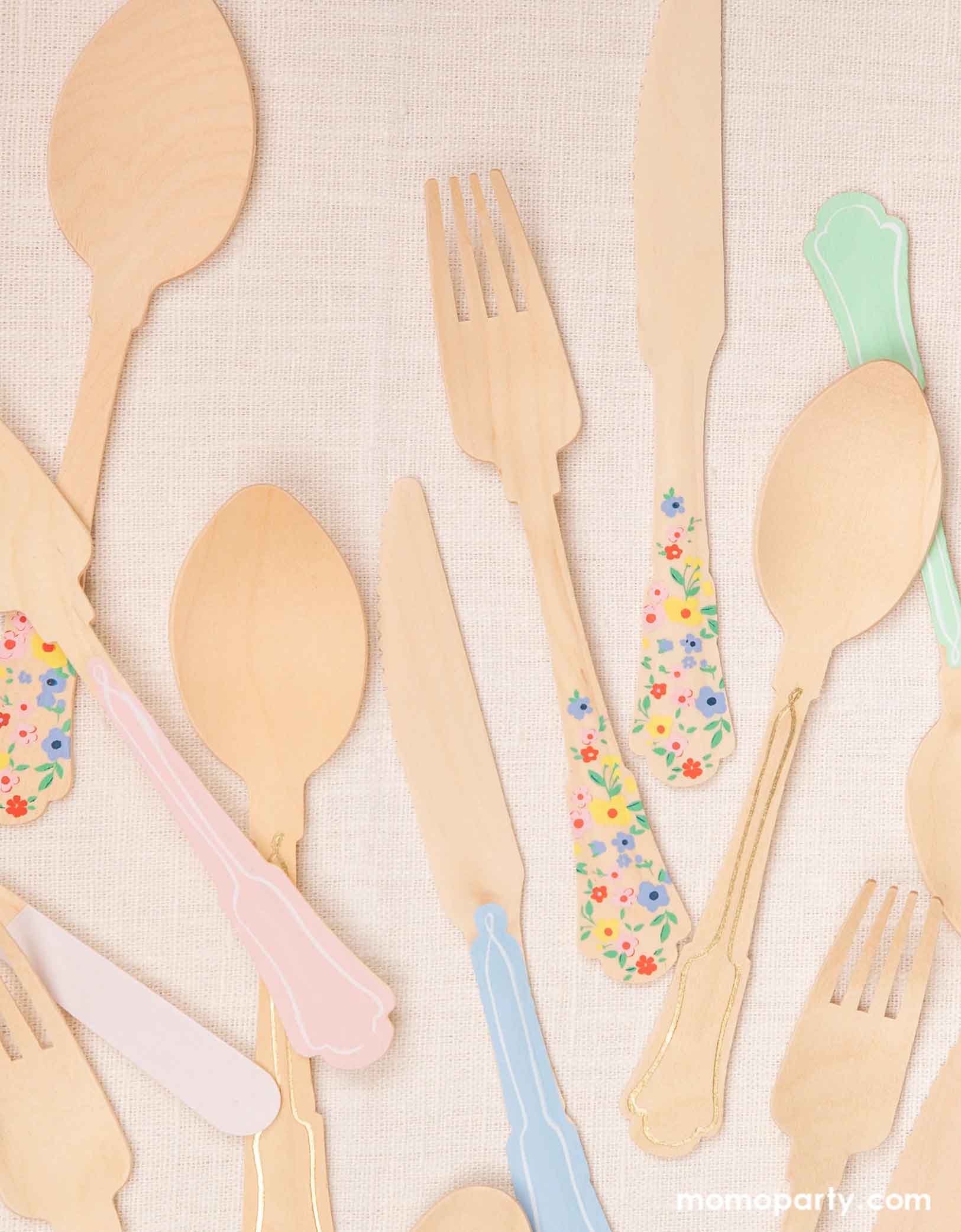 Momo Party's Elegant Wooden Cutlery Set by Meri Meri in various colors and designs of the handles including pastel pink, blue, mint and floral. Comes in a set of 24, made of eco- friendly birchwood with sculpted handles, they are 100% biodegradable. This set features colorful handles for a fresh, summery look. 