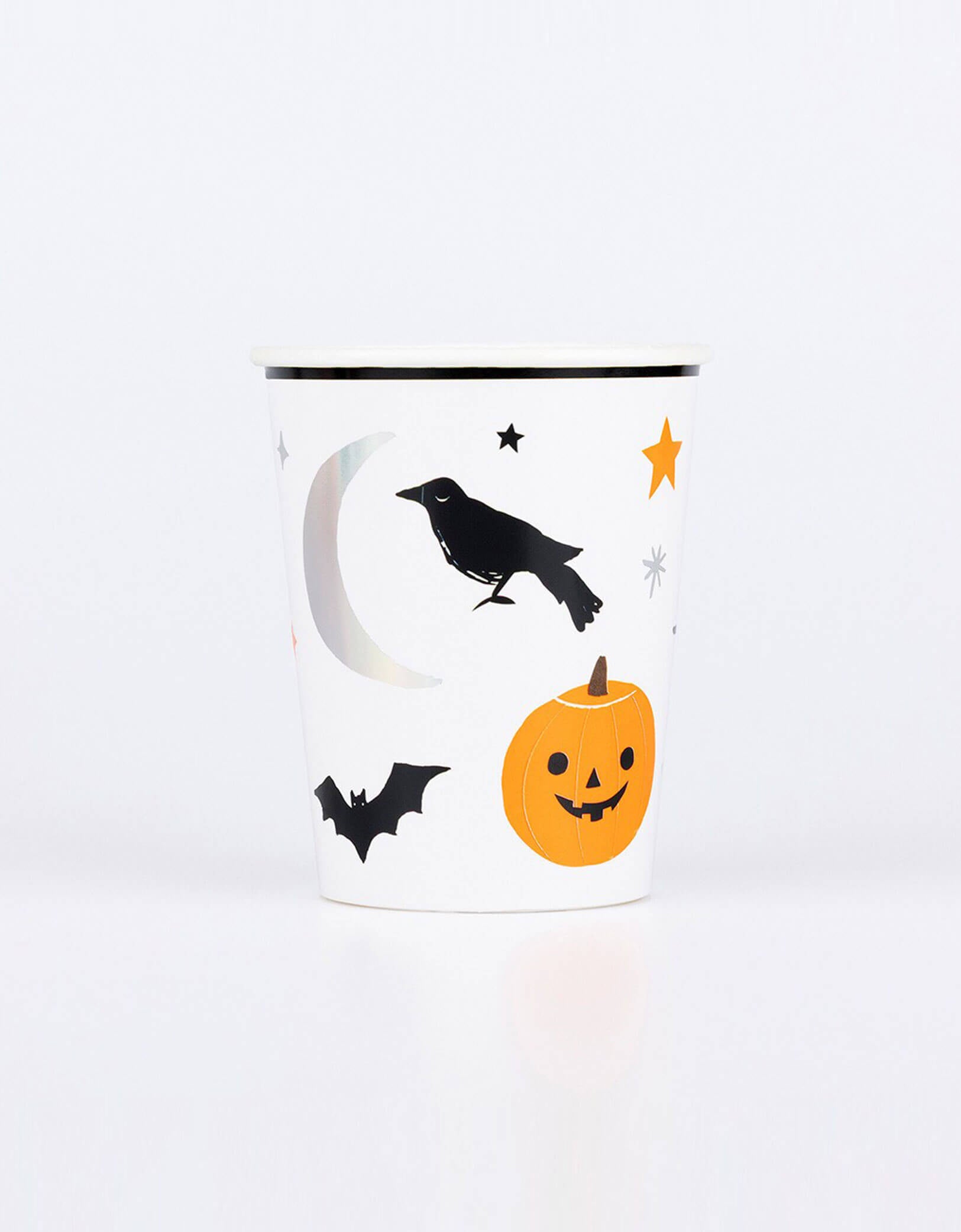 Momo Party's 9 oz Halloween party cup with pumpkins, bats, and a crow design by Meri Meri on a white background. Comes in a set of 8, these premium paper cups will instantly give your Halloween party a hauntingly stylish look. The combination of traditional Halloween icons and colors, teamed with modern pops of holographic silver, is perfect for a gathering that's equal parts eerie, elegant and fun.