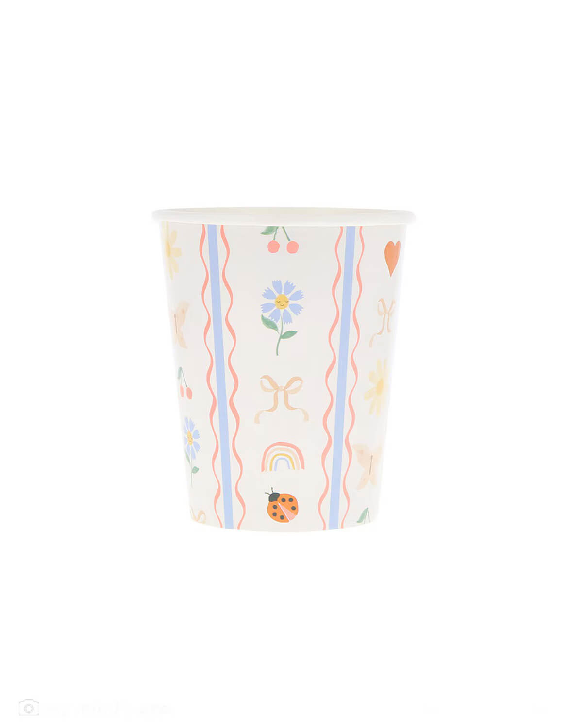 Momo Party's 9oz little garden party cup with  textile-inspired pattern of ladybugs, hearts, bows, flowers and rainbows enchant in soft pink, red and blue tones by Meri Meri on a white background.