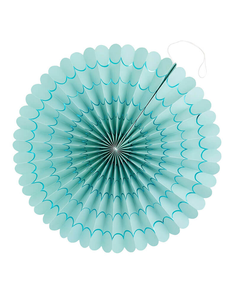 A close up shot of the aqua wave paper fan from Momo Party's Under the Sea Fan Set by My Mind's Eye. Comes in a set of 6 paper fans 6 fans of size 14", 8.5", 8", 7", and 5.5" in pastel colors of aqua, pink, lilac, teal, cream and peach, this mermaid-inspired fan set will add an enchanting touch to any under the sea themed celebration. Bring the ocean to your event and create a memorable atmosphere.