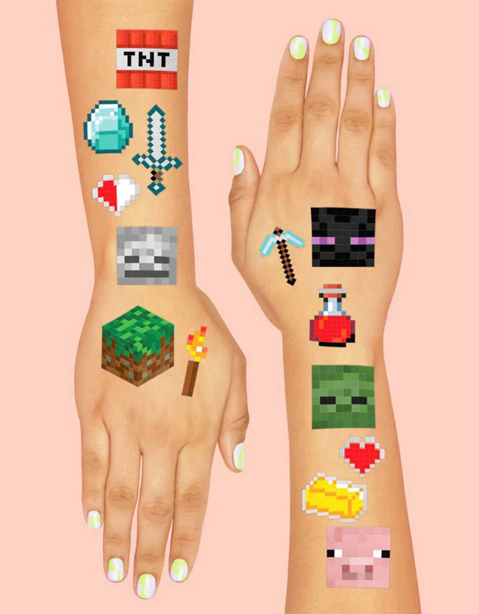 Two arms with Minecraft-themed temporary tattoos featuring pixelated block designs including TNT, creeper, pig, pixel axes, pixel swords etc. from Momo Party on a pink background.