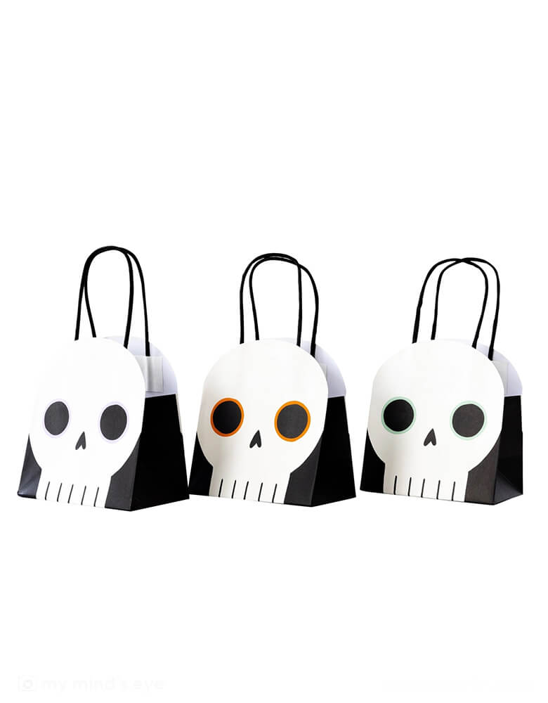 Momo Party's Skulls Treat Bags by My Mind's Eye. Comes in a set of 6 treat bags in 3 different colors/designs, these skull-shaped goodie bags are perfect for providing your friends and family with just the right amount of fright and delight at your Halloween party!