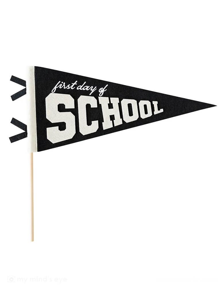 Momo Party's 14" first day of school felt pennant by My Mind's Eye. Featuring the celebratory phrase "first day of school," this felt banner will bring vintage vibes to first day of school photos, back to school breakfast parties or as the perfect desk decoration for your new favorite teacher!
